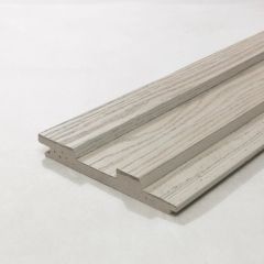 This Millboard Cladding board shows composite core with a rubberised coating on the exterior of the boards